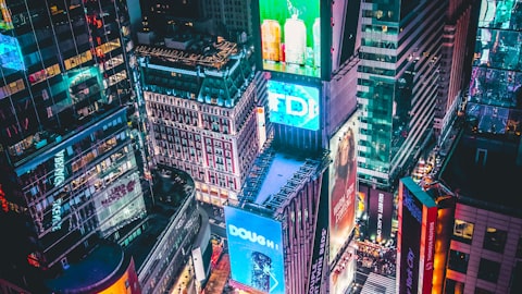 Times Square at night with bright digital billboards