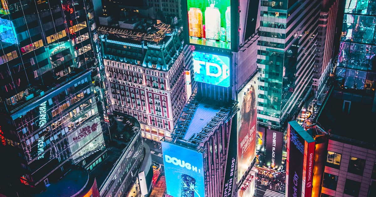 Times Square at night with bright digital billboards